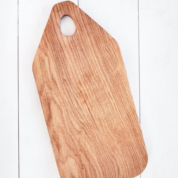 Large wooden cutting board on a white background